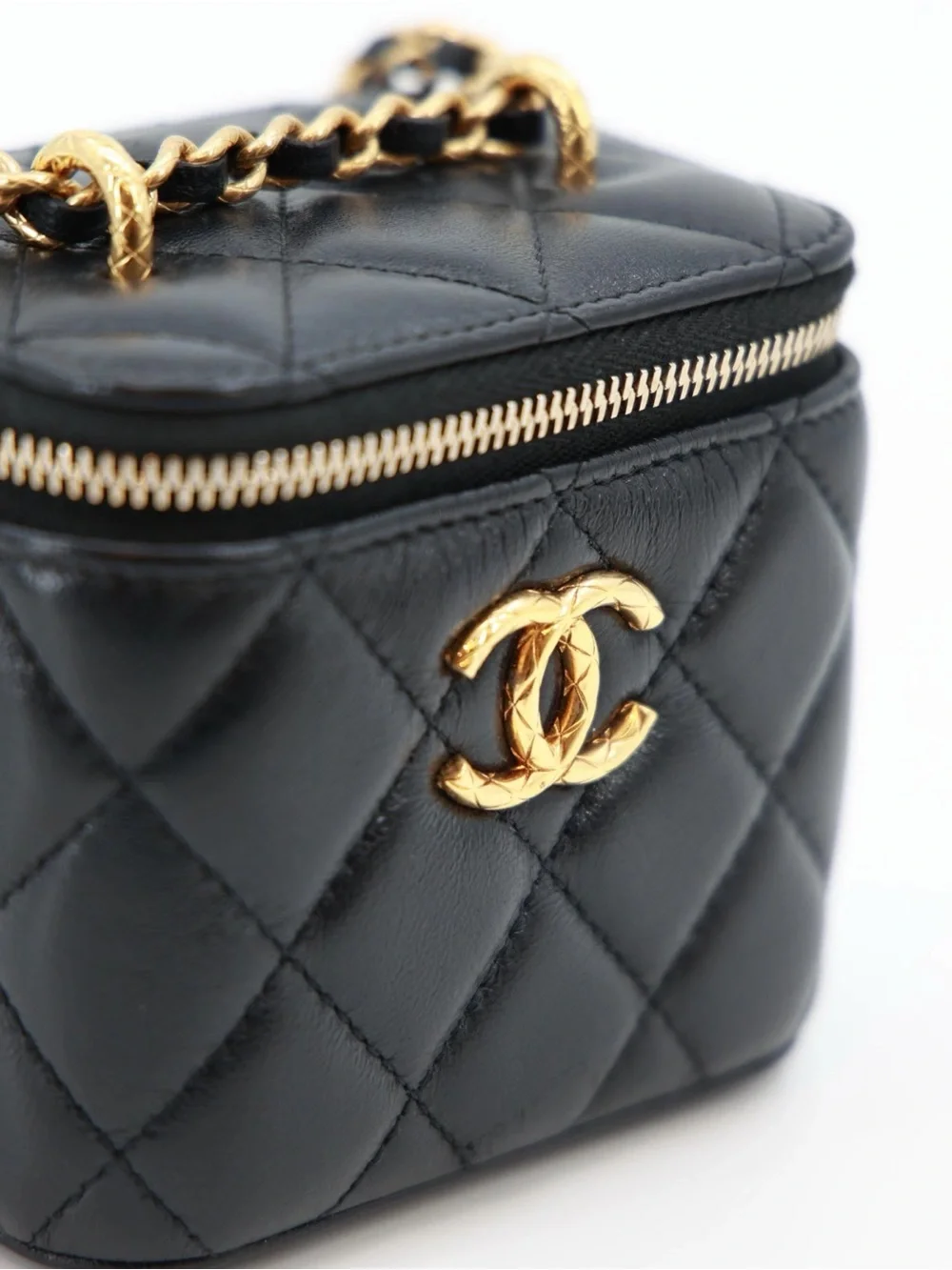 CHANEL Black Quilted Lambskin Mini Vanity Case with Gold Carving CC